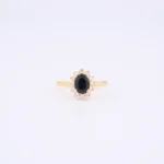 Pierścionek z żółtego złota z brylantami i szafirem - próba 585